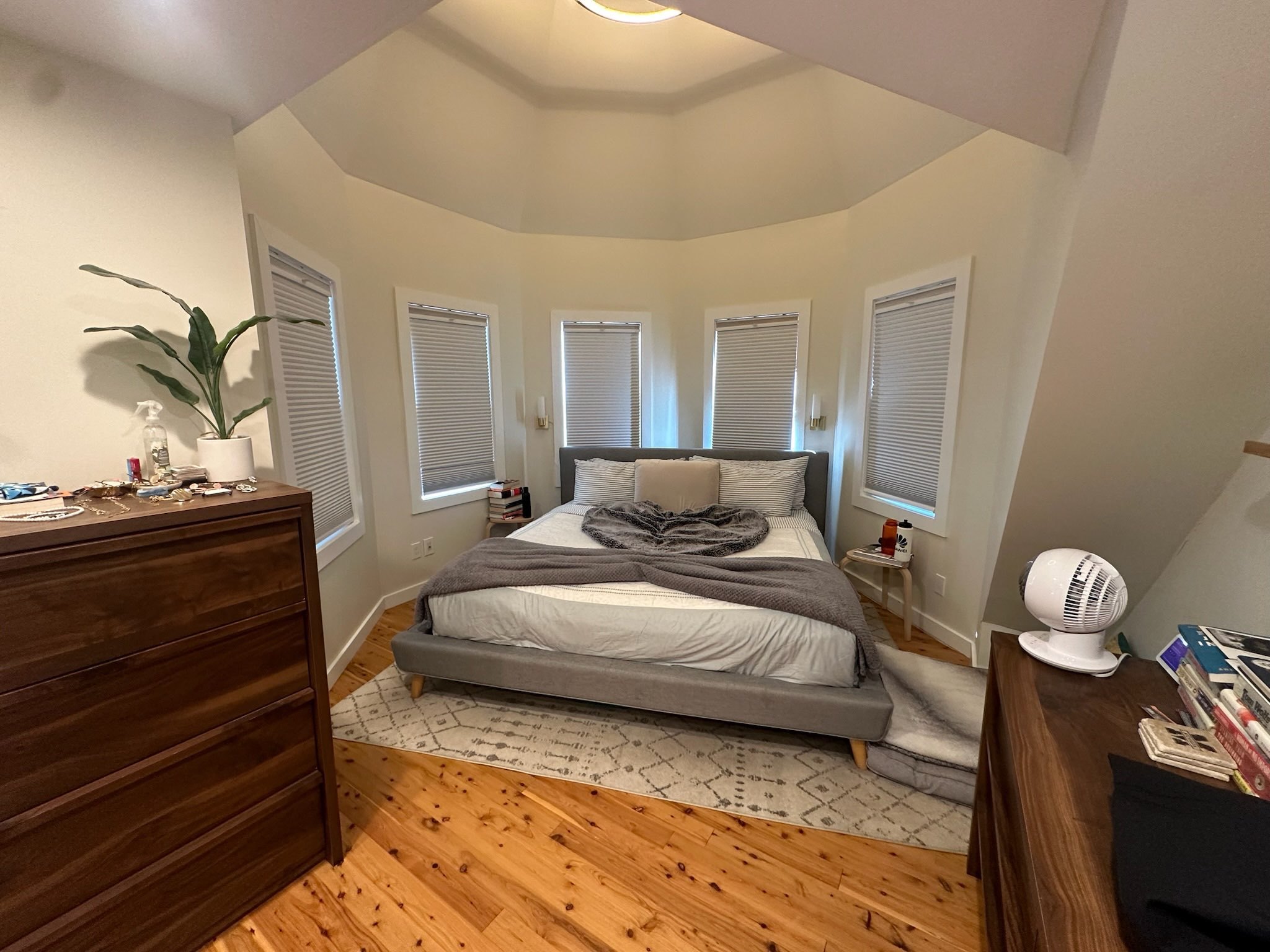 Bedroom with Bay Window and Fan